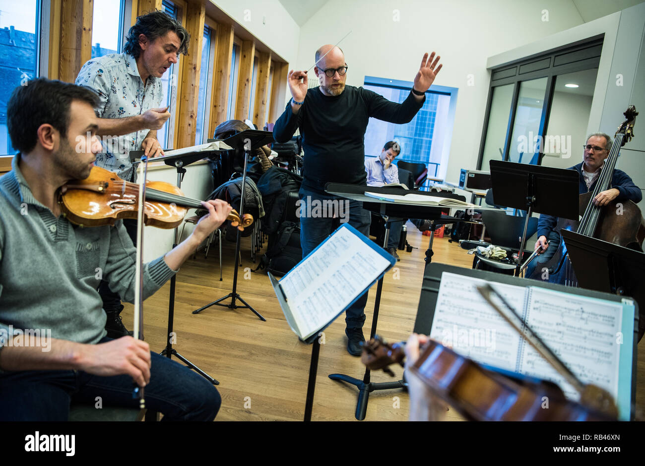 Darmstadt Germany 27th Nov 2018 Ben Palmer M Chief Conductor Of The Deutsche Philharmonie Merck Rehearses With The Musicians Alexander Keimbacher L Tenor Sings The German Philharmonic Merck Was Founded In 1966