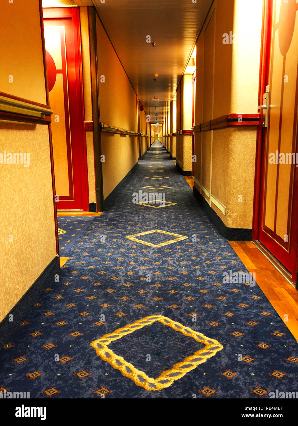 Very Long Corridor Of Ocean Cruise Ship Rooms At Both Sides Long