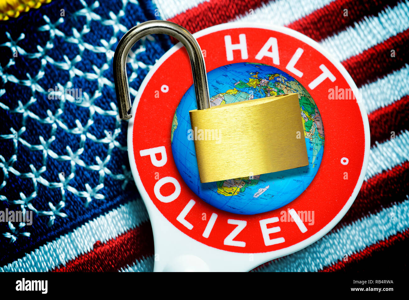 US flag, signalling disc and open padlock, global policeman USA Stock Photo
