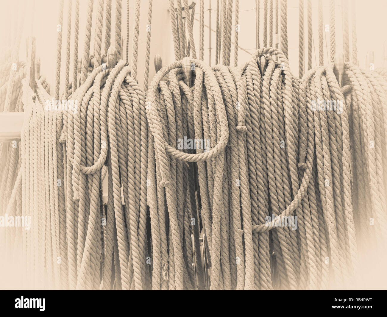Old fashioned harbor marina sail boat ropes. Yachting details and ...