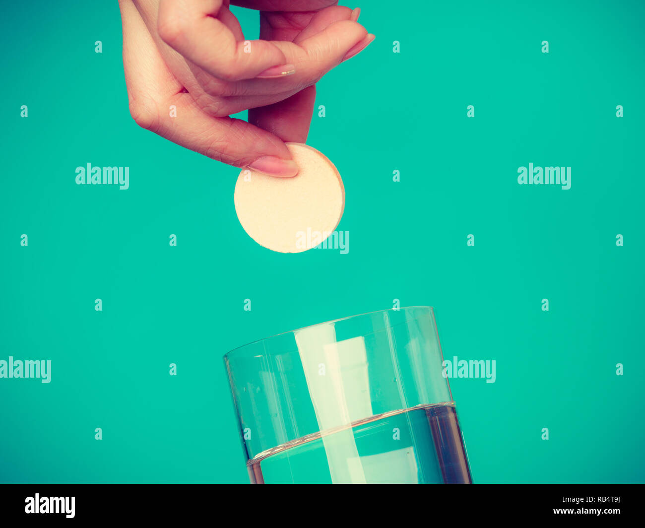 Vitamins, health, medicines. Person throwing vitamin mineral supplement