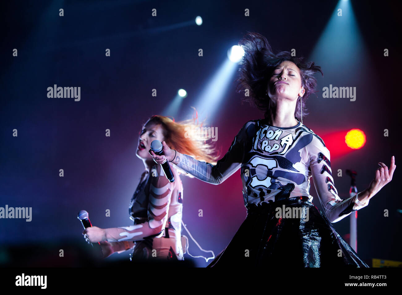 The Swedish electro house and synthpop duo Icona Pop performs a live  concert at the Danish music festival Roskilde Festival 2014. The duo  consist of the members Caroline Hjelt (L) and Aino