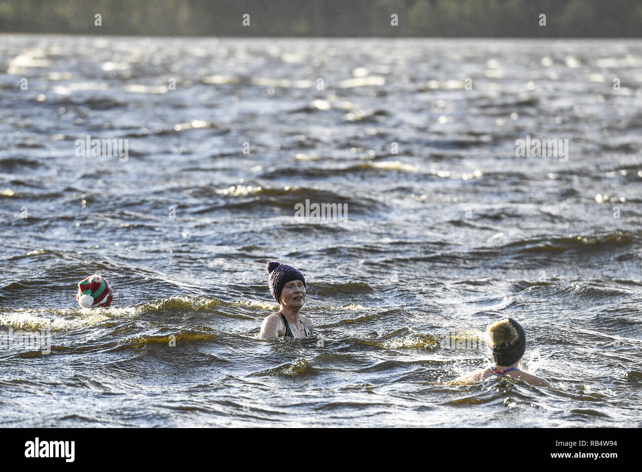 Cairngorm swimmers Nina Caudrey, Phil Shipman, and Wendy Grosvenor take