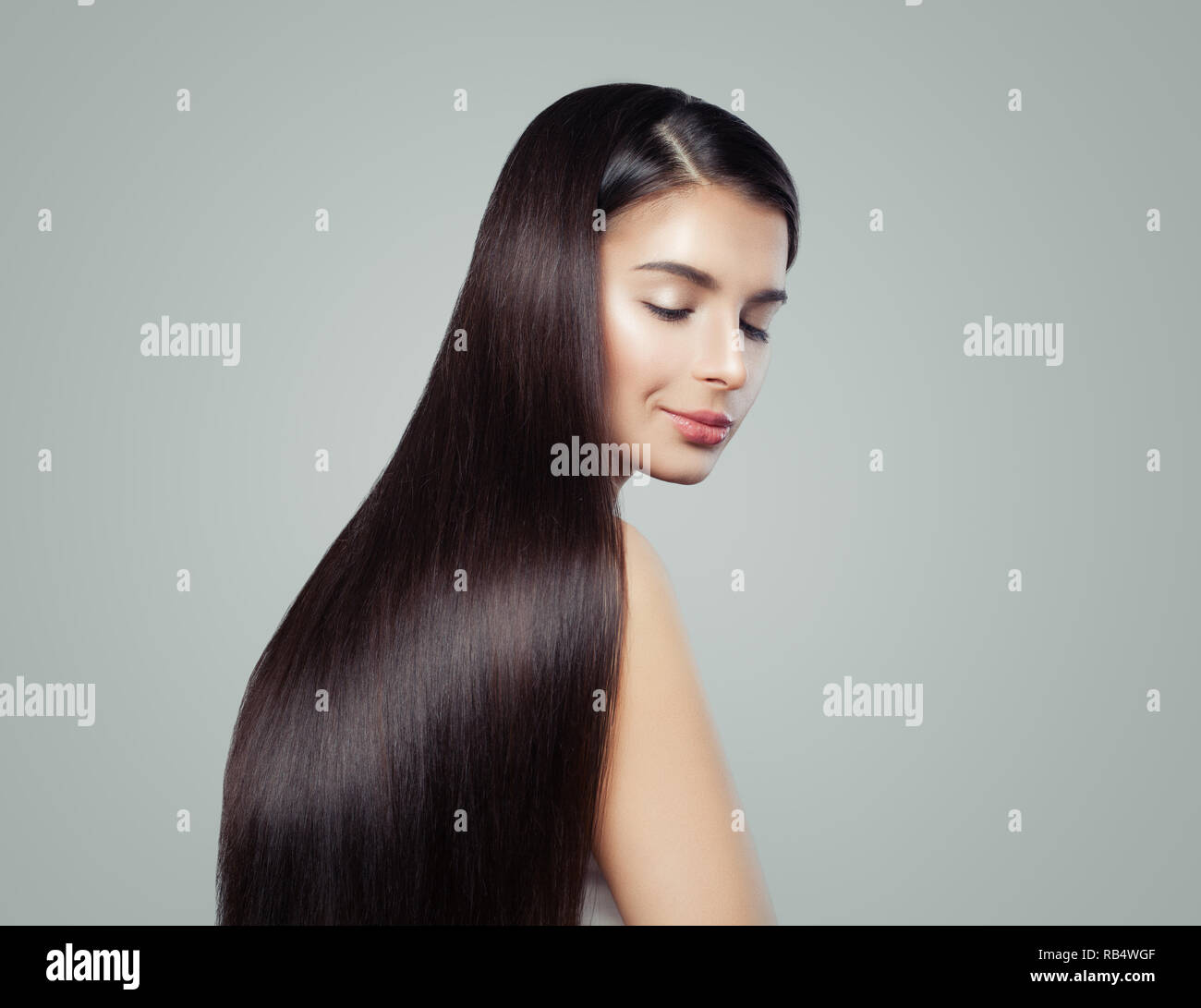 Brunette Woman With Long Healthy Shiny Straight Hair Fashion