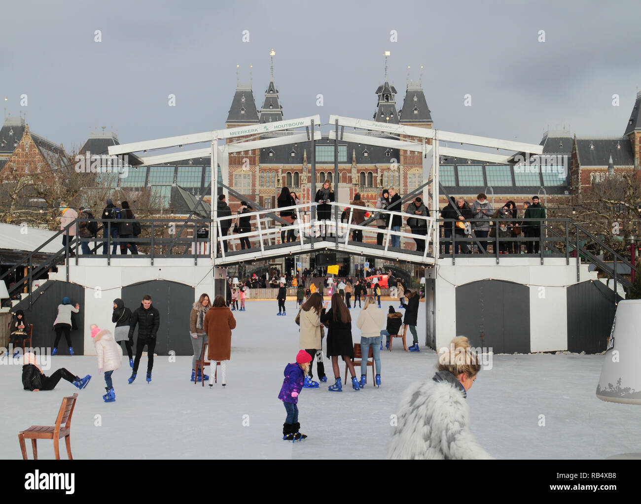Skaters on ice rink in Museum Square, Amsterdam, in December Stock Photo