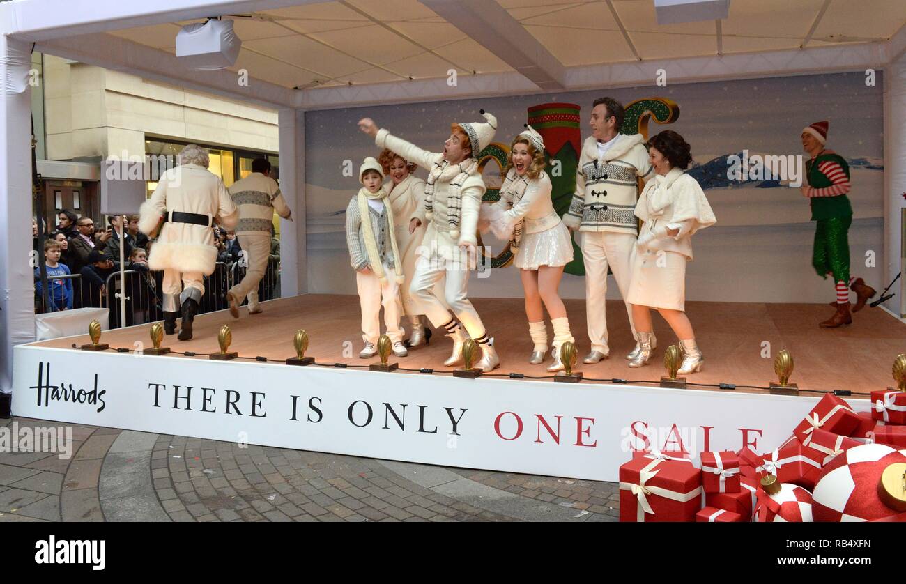 The cast of the West End musical Elf participate in the opening of