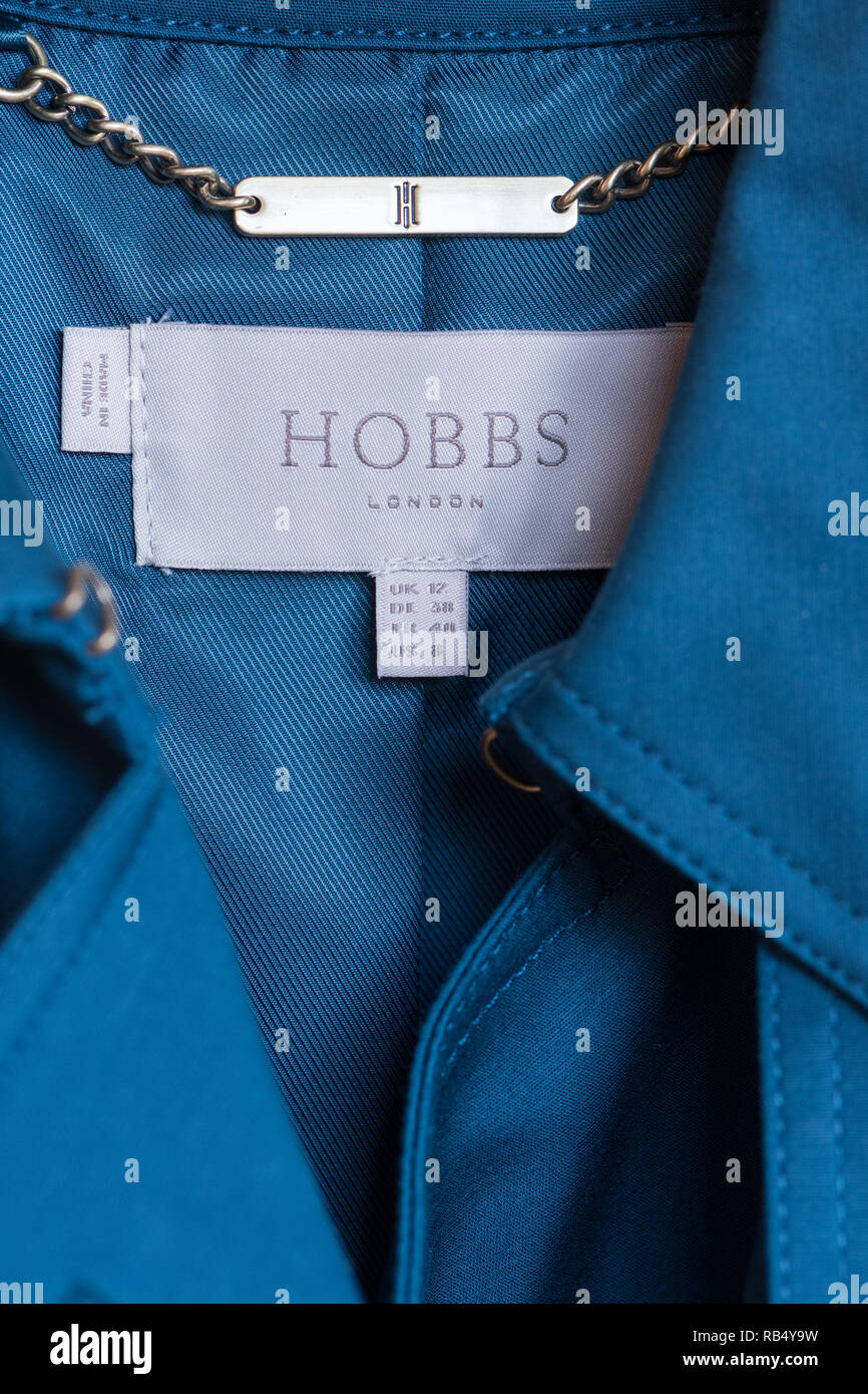 Hobbs clothing label inside trench coat Stock Photo