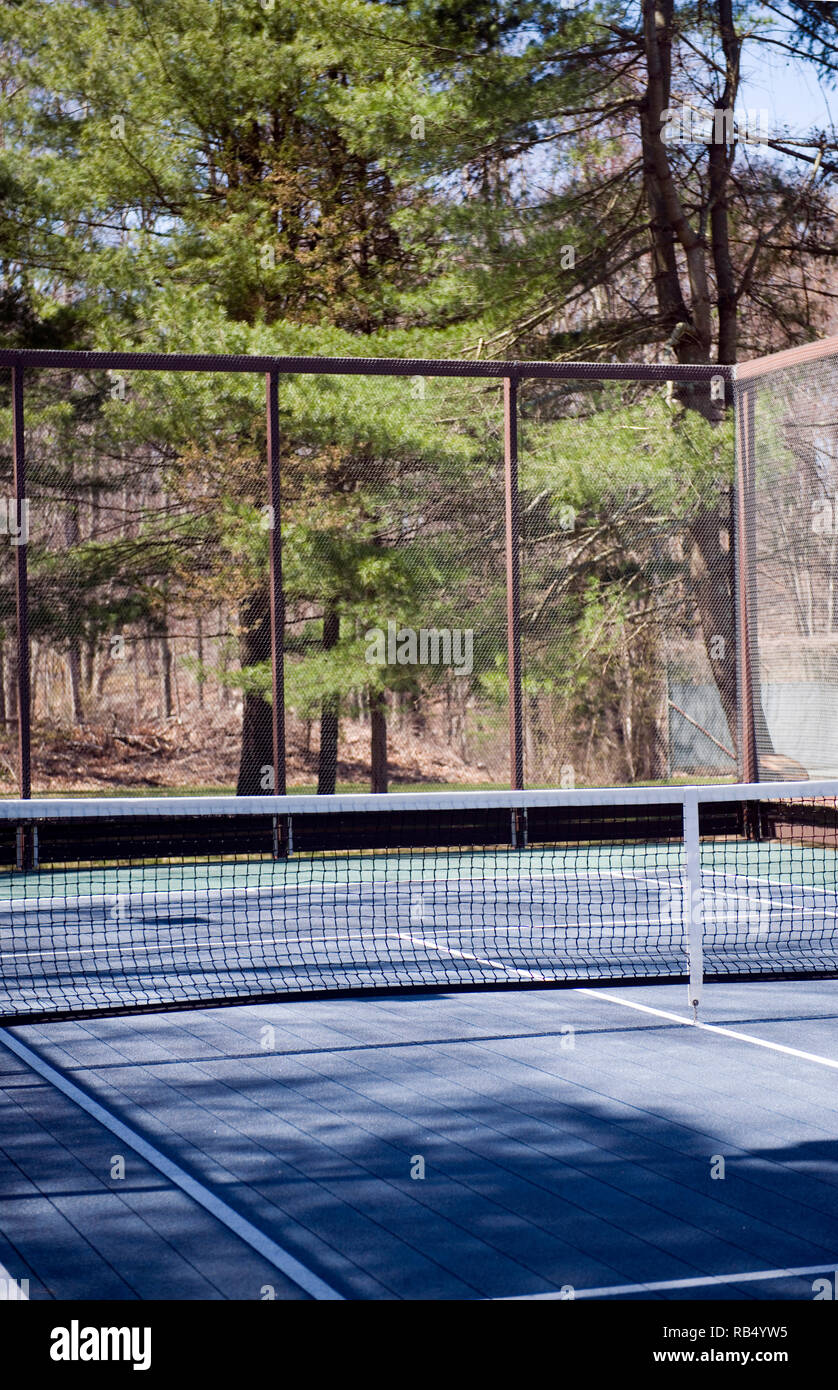 platform tennis paddle court in woods in suburban setting private club Stock Photo