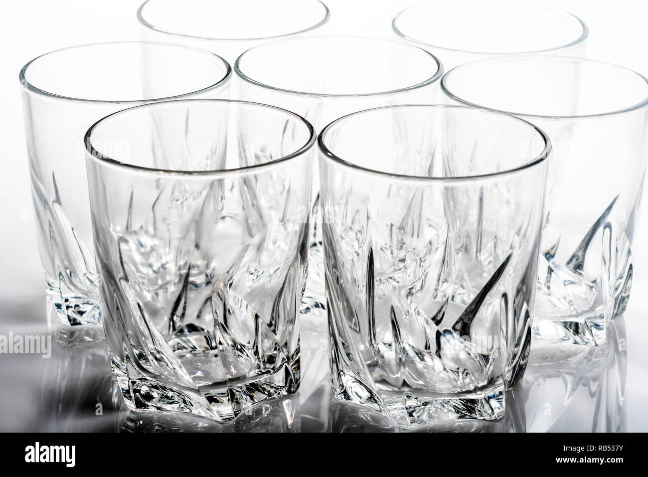Group of glass tumblers with a heavy, chunky design. Stock Photo