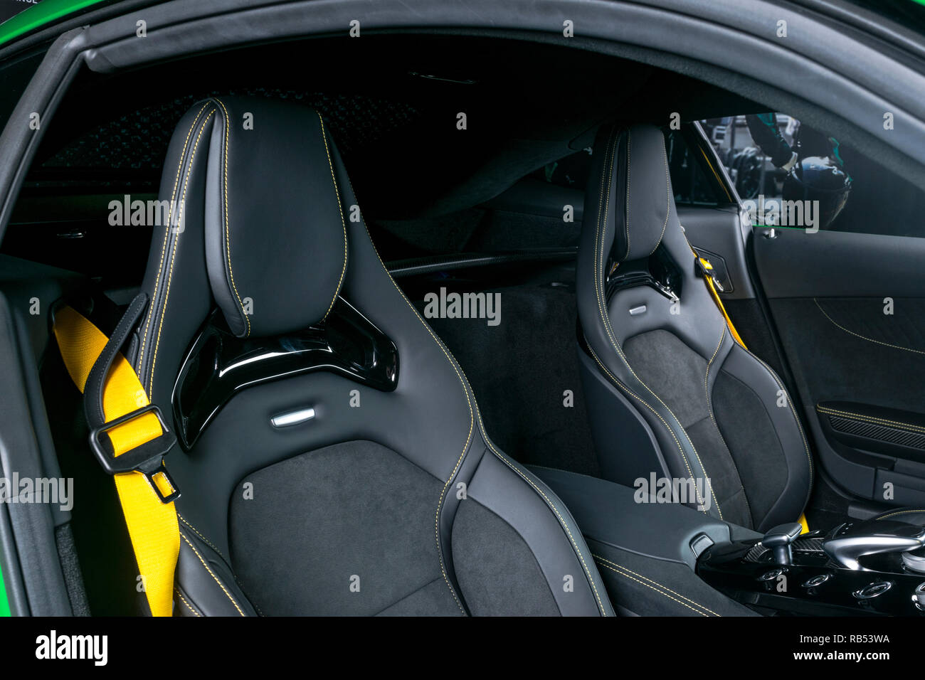 Modern Luxury sport car inside. Interior of prestige car. Black Leather