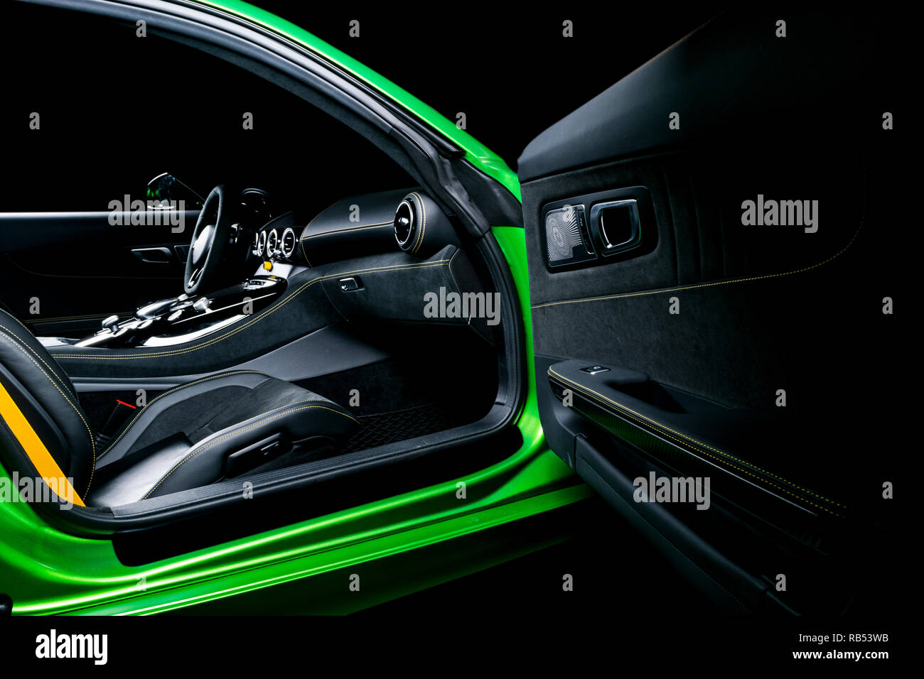 Modern Luxury sport car inside. Interior of prestige car. Black Leather