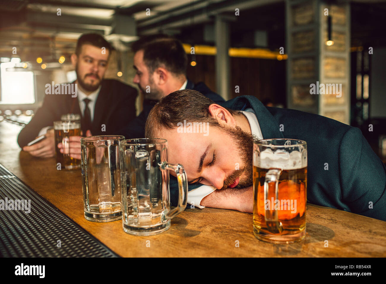 People Drinking Alcohol At Bar