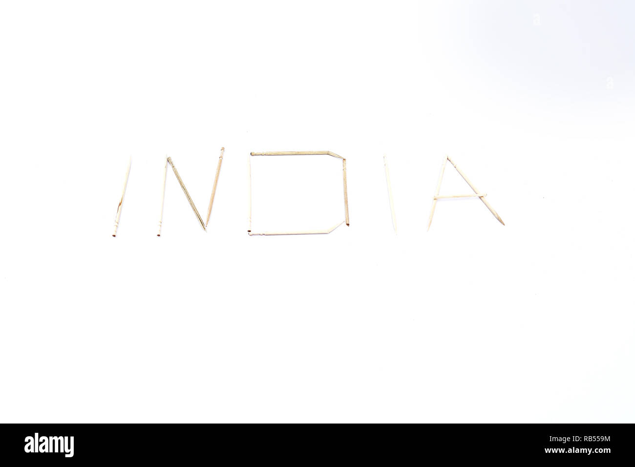 Photo of wooden toothpicks design. Isolated on the white background ...