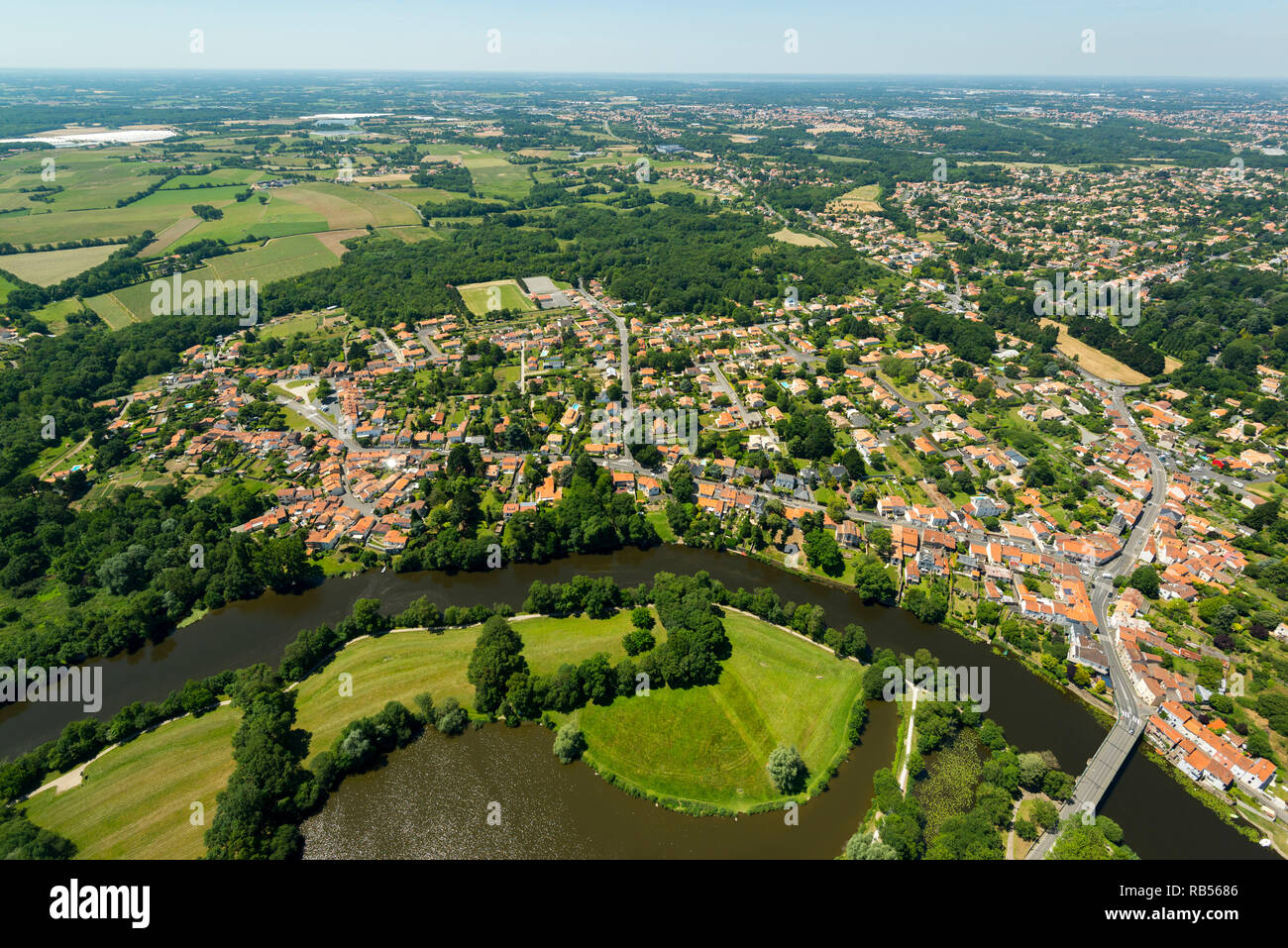 Vertou (western France). Aerial view of the city and the surrounding countryside with the Sèvre Nantaise river and the dam “Chaussee des Moines”. Stock Photo