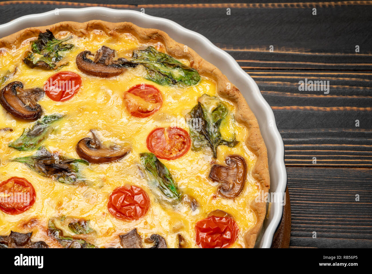 Baked homemade quiche pie in ceramic baking form Stock Photo Alamy