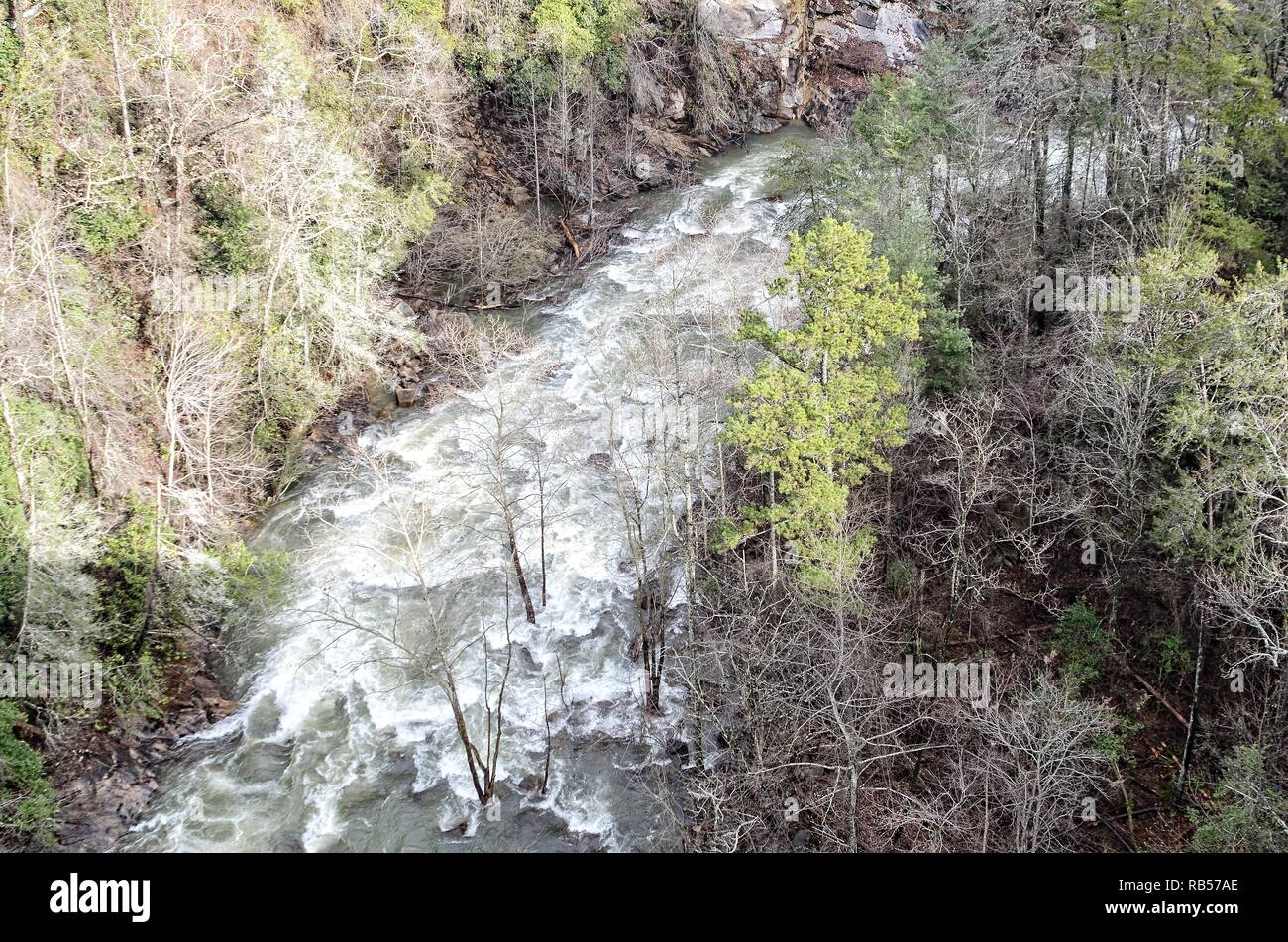The Tallulah River in Georgia flowing swiftly through the gorge after a winter storm. Stock Photo