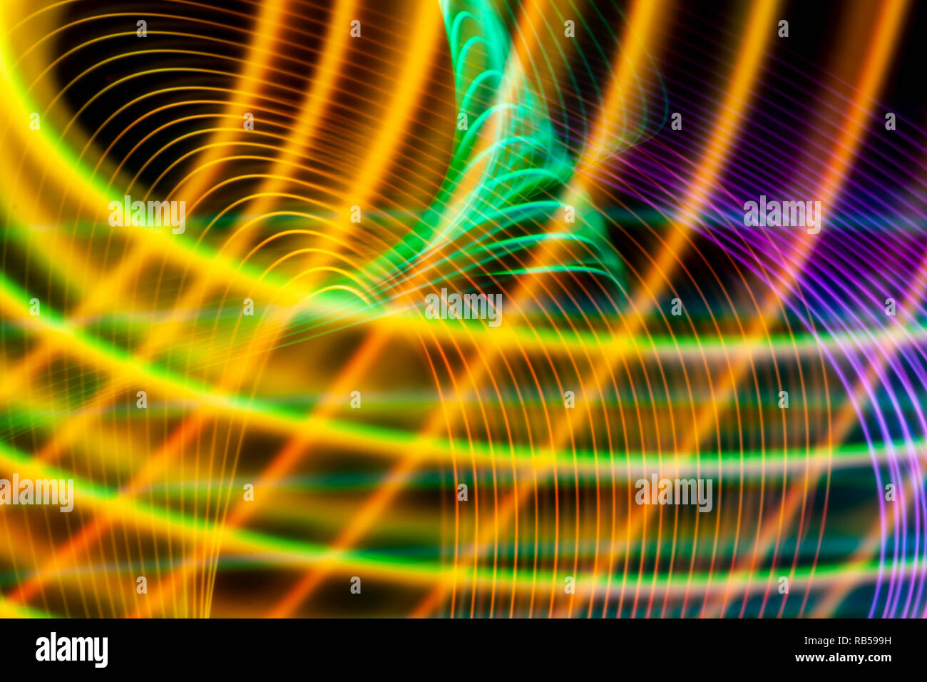 Abstract light rainbow trails in random motion background image ...