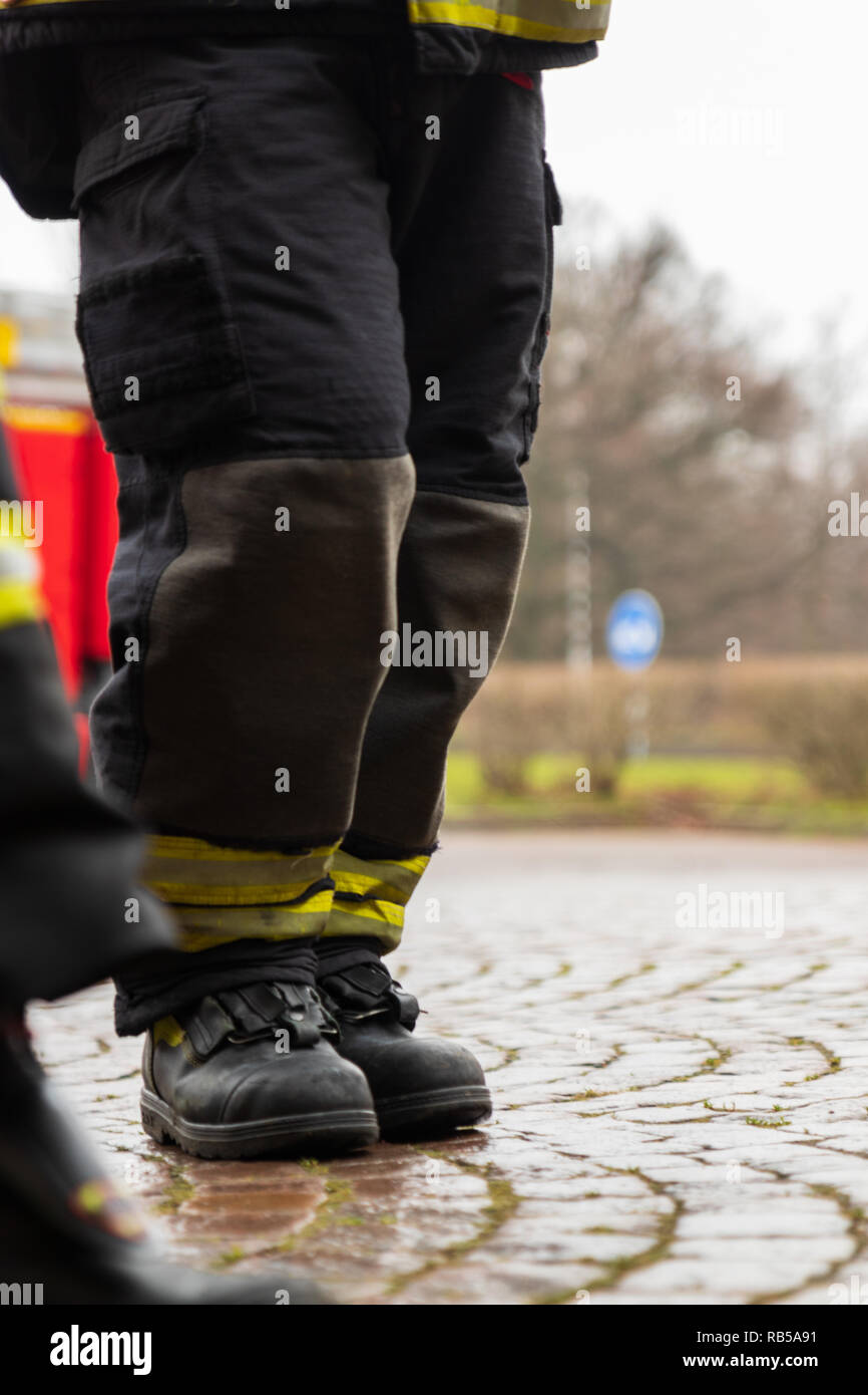 Firefighter boots standing hires stock photography and images Alamy