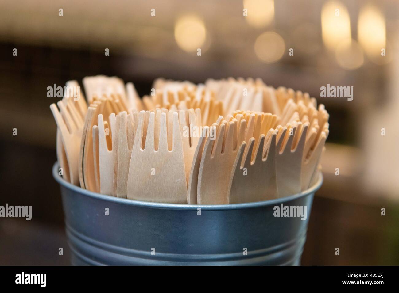 Recyclable wooden spoons in a chip shop in the UK Stock Photo Alamy