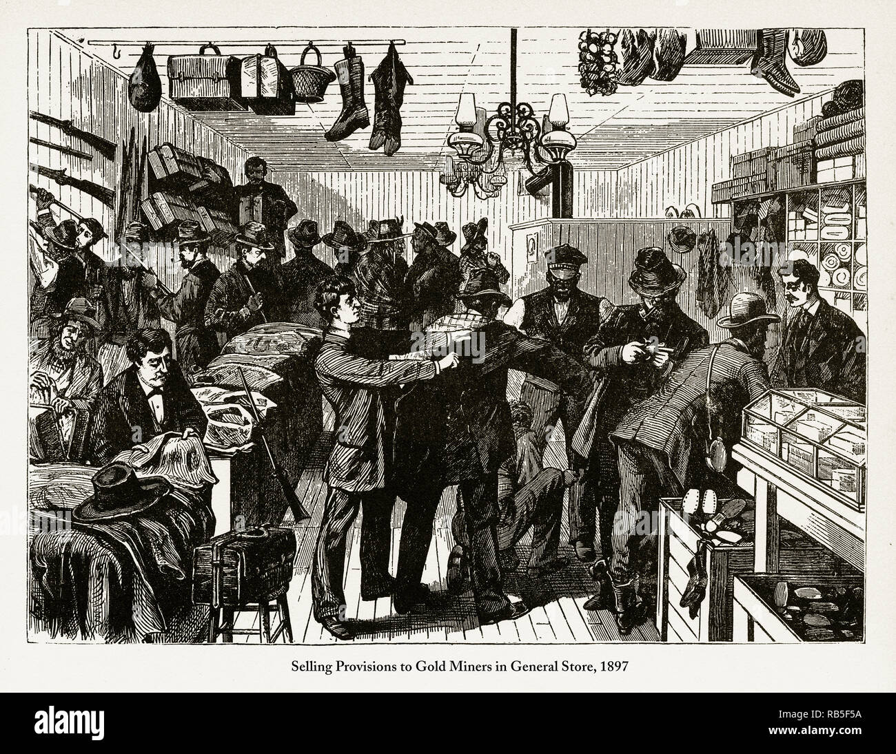 Selling Provisions to Gold Miners in General Store Engraving, 1897 Stock Photo