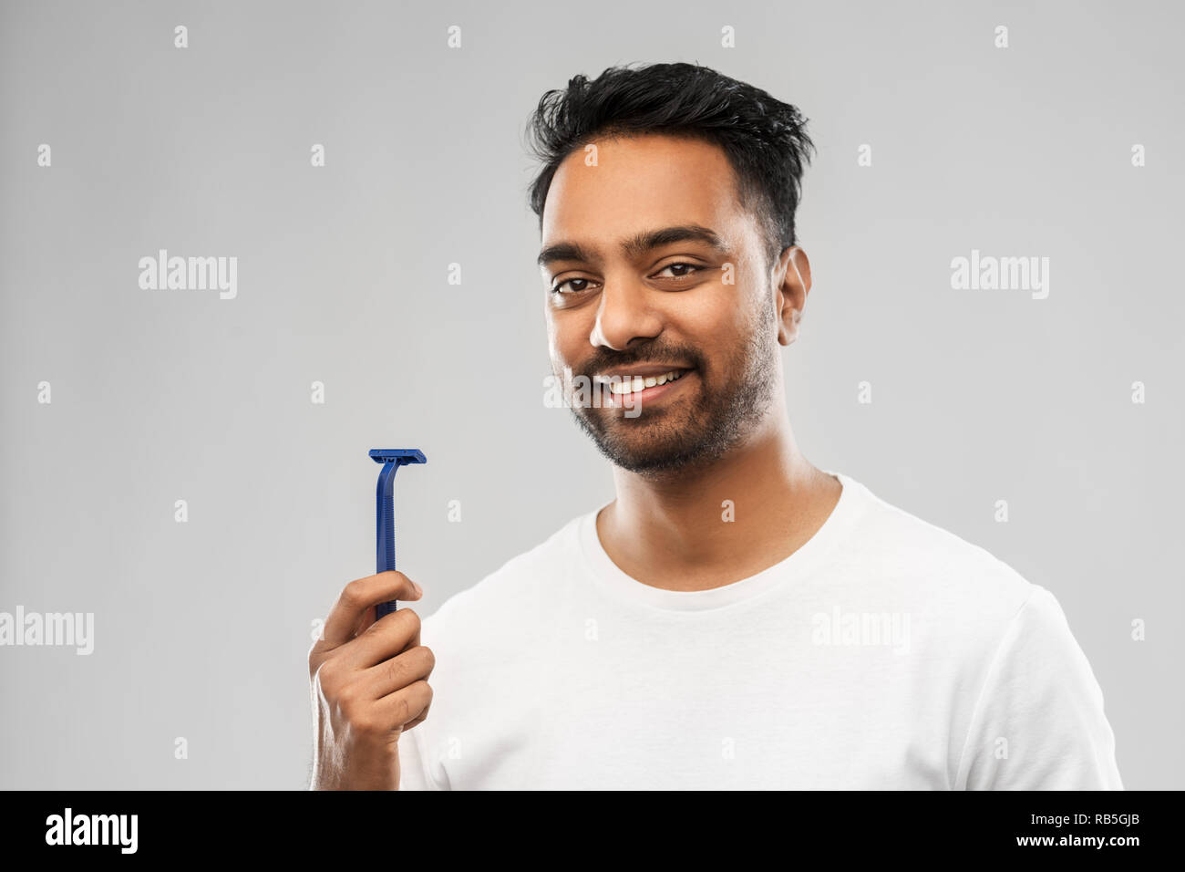 indian man shaving beard with razor blade Stock Photo Alamy