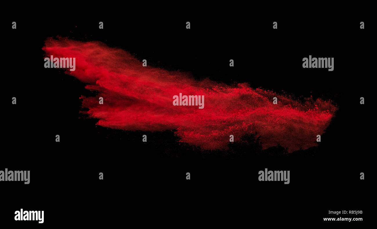 Explosion of colored powder on black background Stock Photo - Alamy