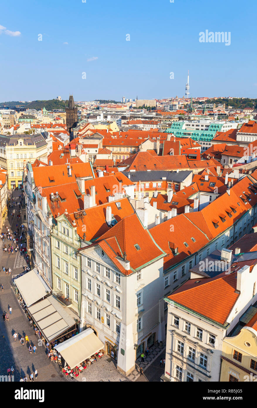 Prague old town square prague looking down on tourists in cafes and