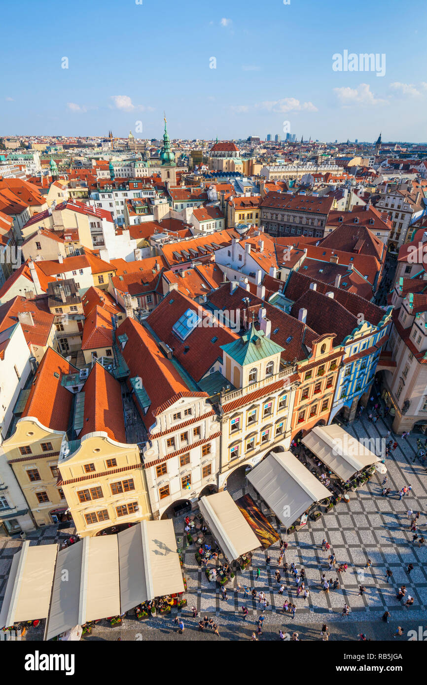 Prague old town square prague looking down on tourists in cafes and