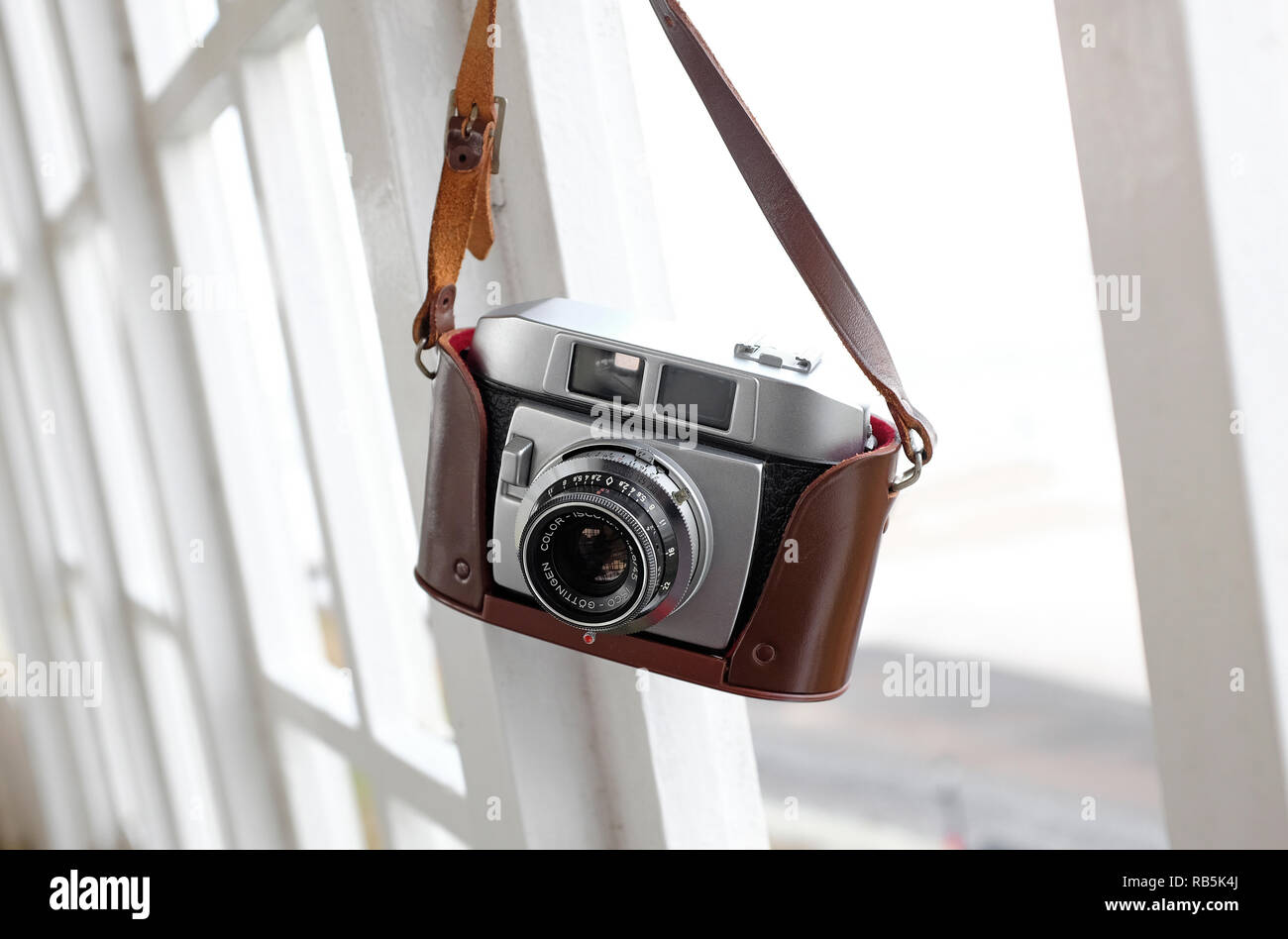 vintage retro 35mm film rangefinder camera in brown leather case Stock Photo