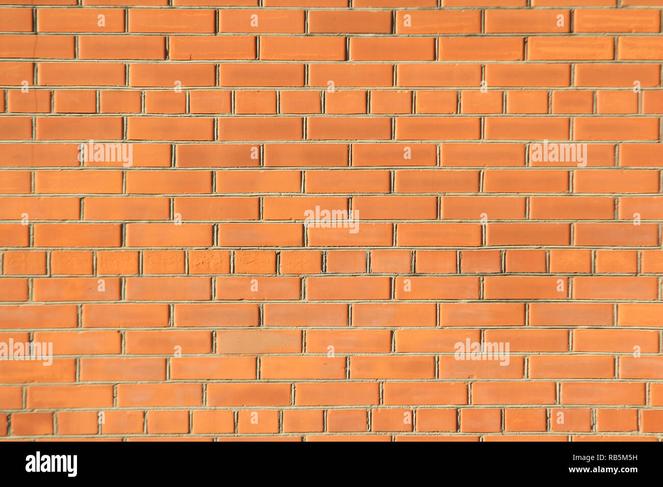 Beautiful view of orange brick wall texture Stock Photo - Alamy