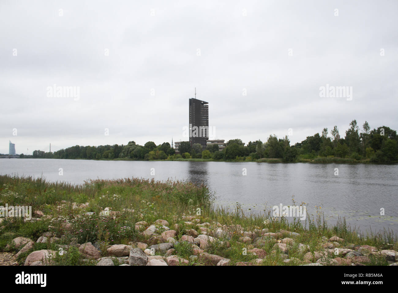 Fantastic view of riverflow through small capital city Riga of Latvia ...