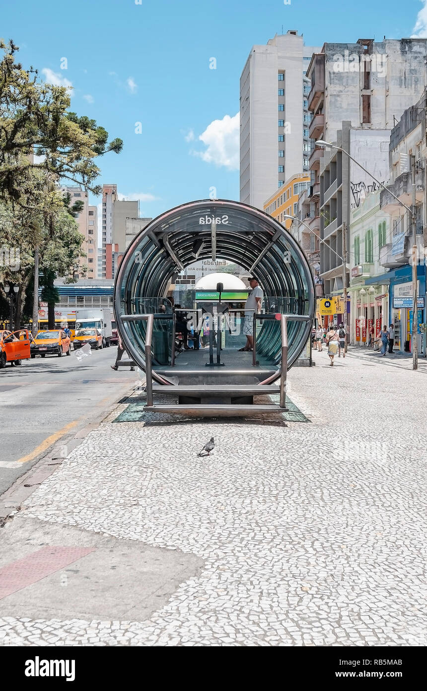 Curitiba - PR, Brazil - December 14, 2018: Entrance of the tubular bus stop of Curitiba. Elevated bus stop station. Public transport stop. Stock Photo