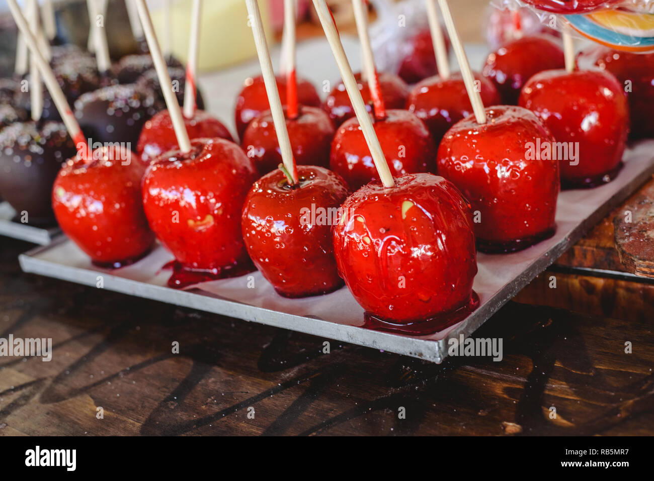 candy apple coated with red caramel candy for sale for kids stock photo alamy https www alamy com candy apple coated with red caramel candy for sale for kids image230622091 html
