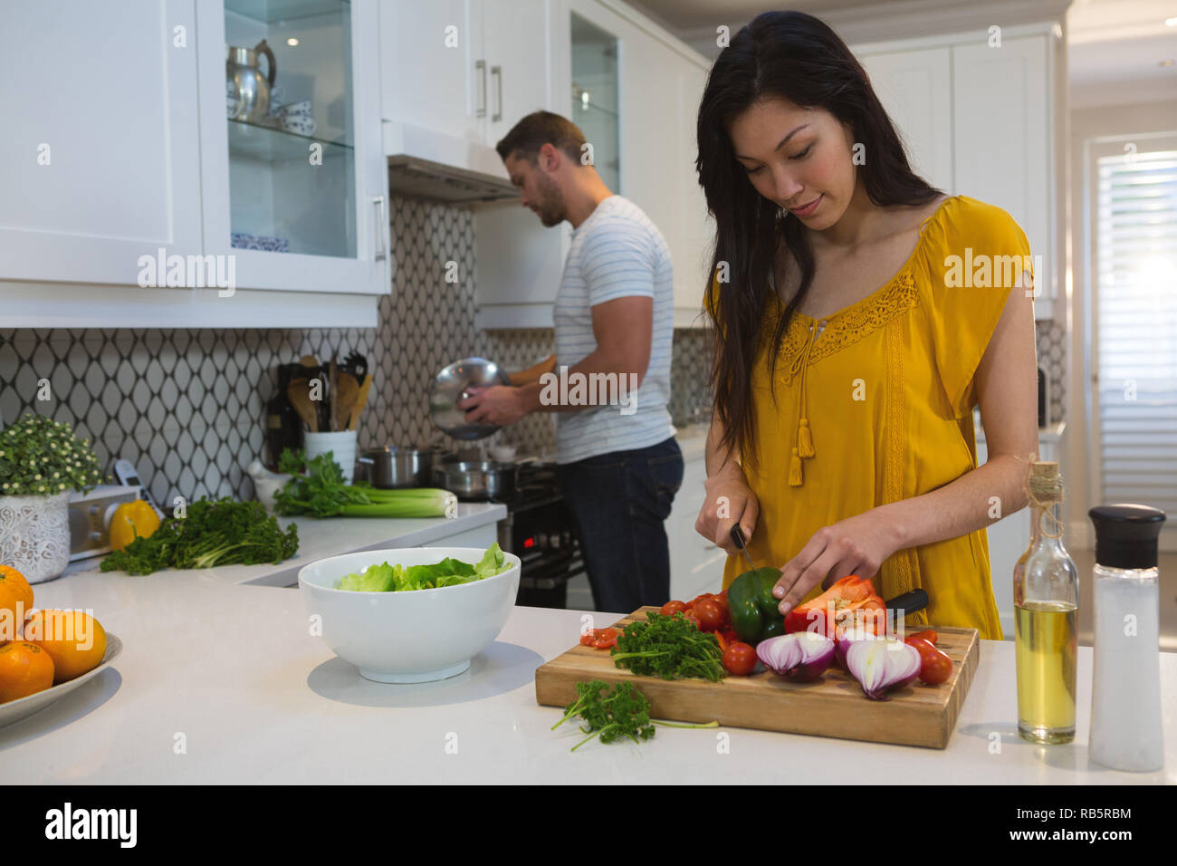 Man cooking in kitchen hi-res stock photography and images - Alamy