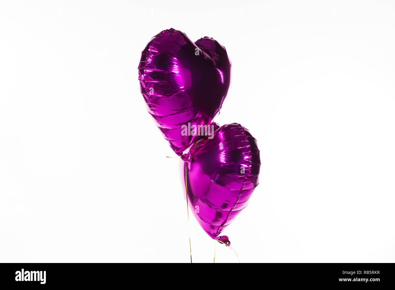 Valentine balloons against white background Stock Photo