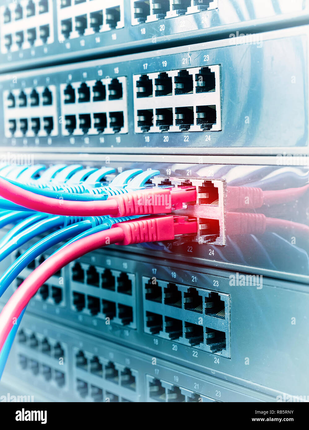 network cable connecting on network core switch close up Stock Photo ...