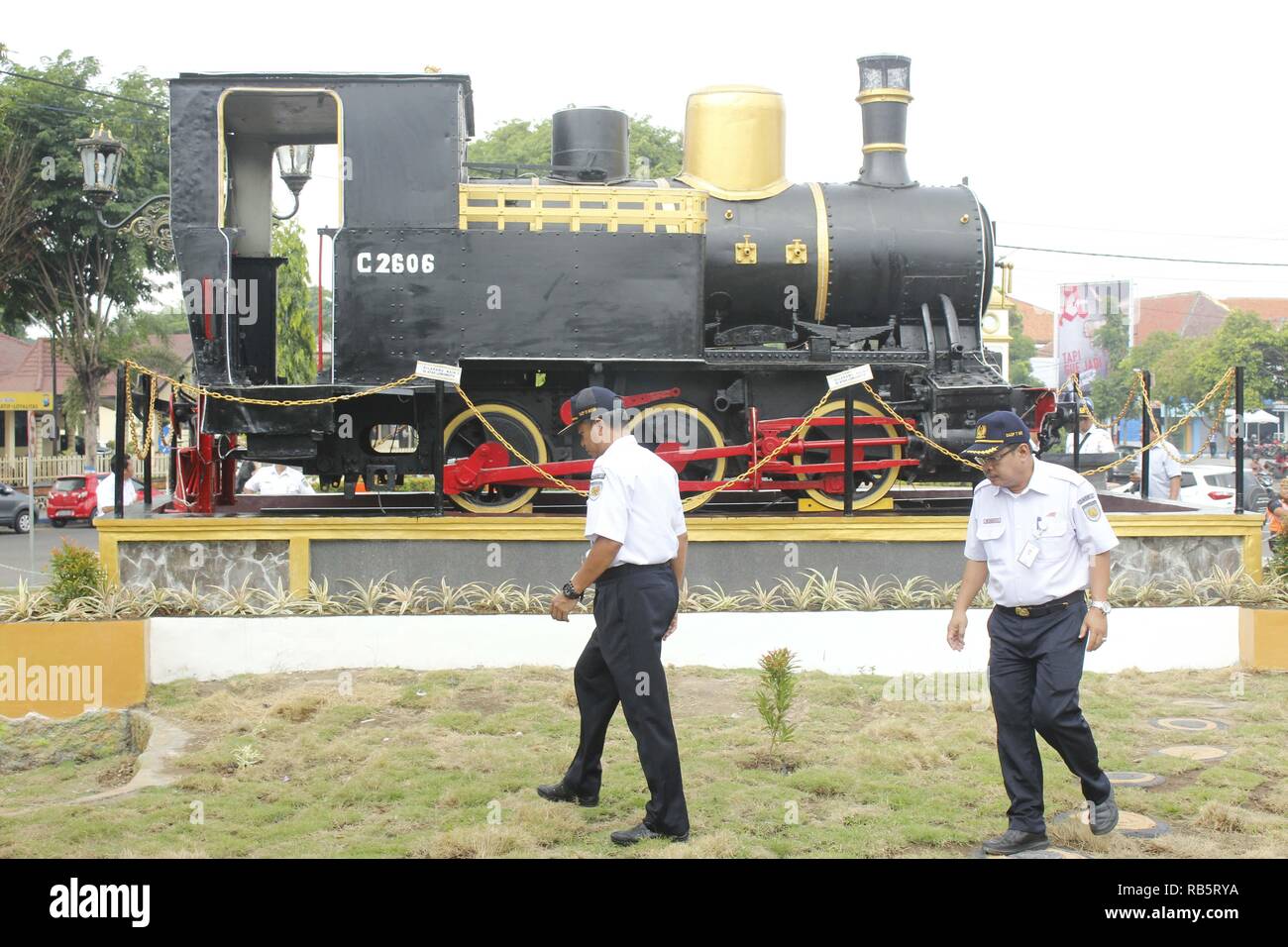 Vice President of PT. Indonesian Railroad/KAI VII Madiun Operation Area,  Heri Siswanto [left] accompanied by Deputy Vice President, Rumekso [right]  reviewed C2606 Locomotive Monument Park near the direct crossing road [JPL]  area
