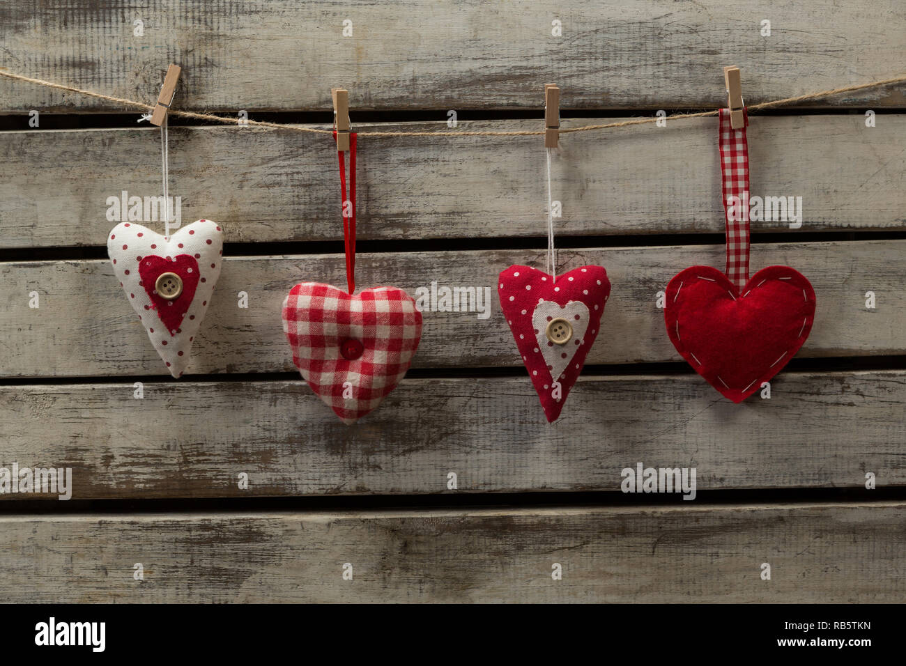 Heart Shape Decorations Hanging On Thread Stock Photo Alamy