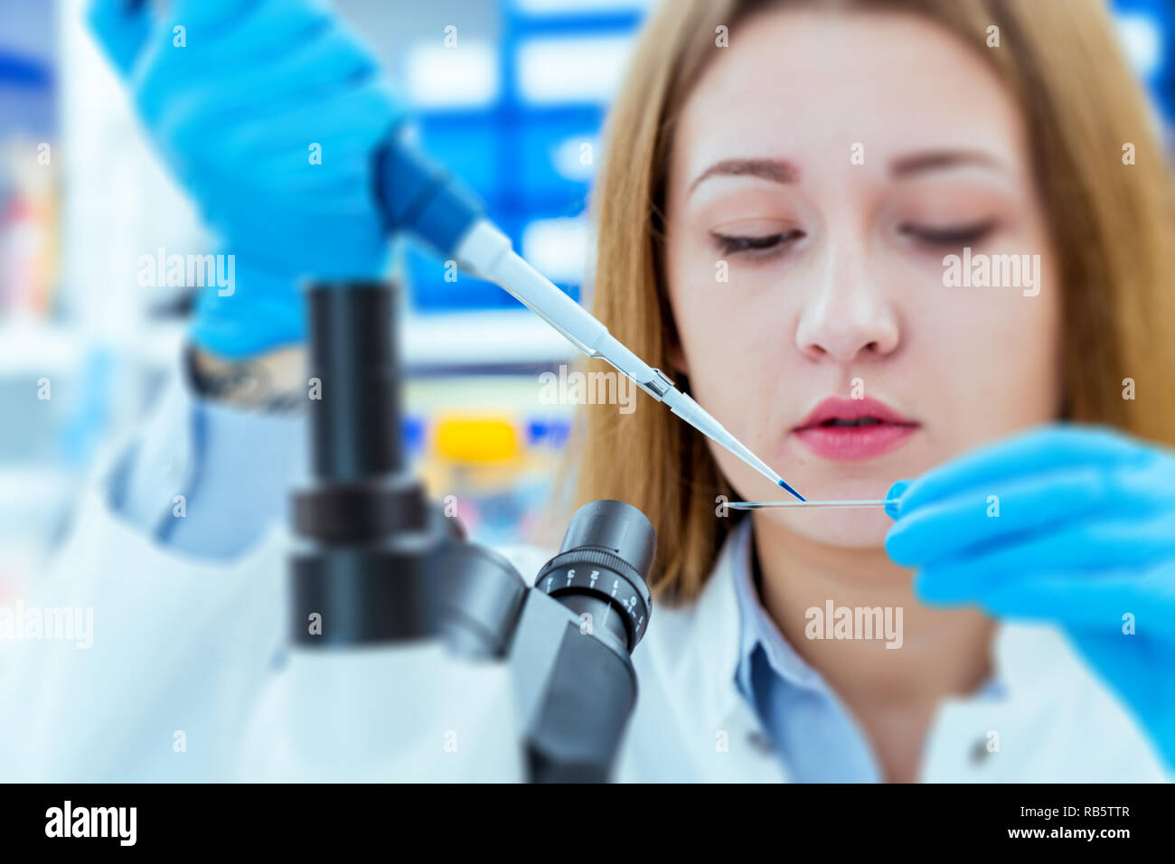 Girl lab technician at the clinic's microbiology laboratory Stock Photo