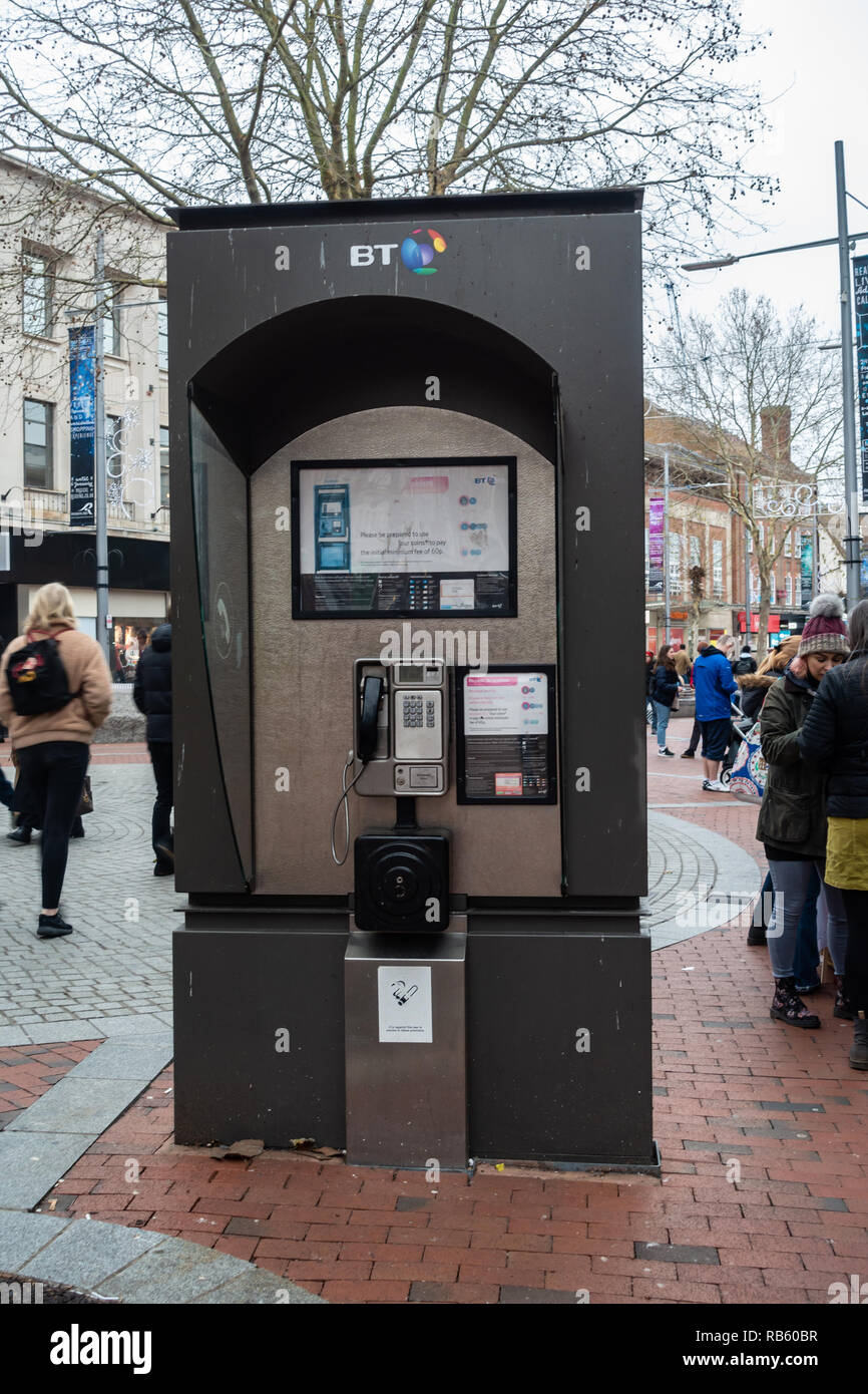 A public pay telephone booth in Broad Street, Reading, Berkshire, UK