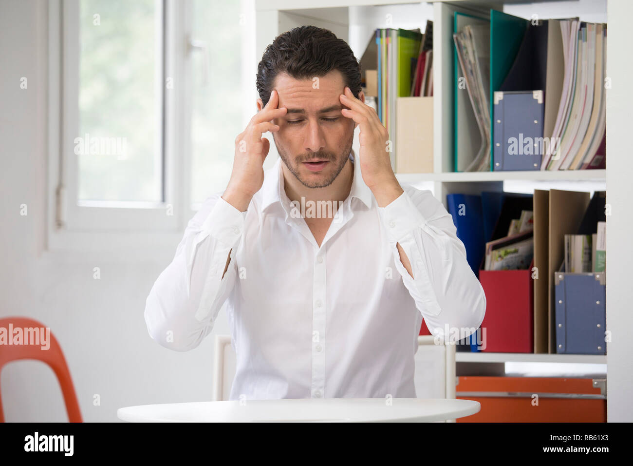 Man suffering from headache. Stock Photo