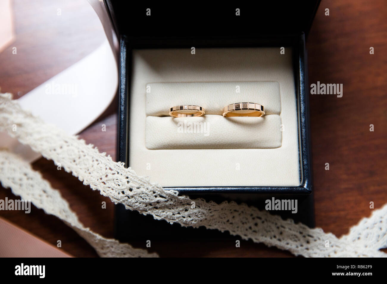 Wedding rings in a black and white jewelry box Stock Photo Alamy