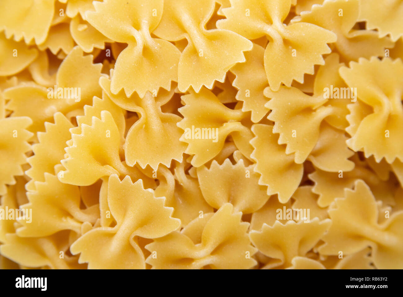 Download Pile Farfalle Yellow Pasta Abstract High Resolution Stock Photography And Images Alamy Yellowimages Mockups