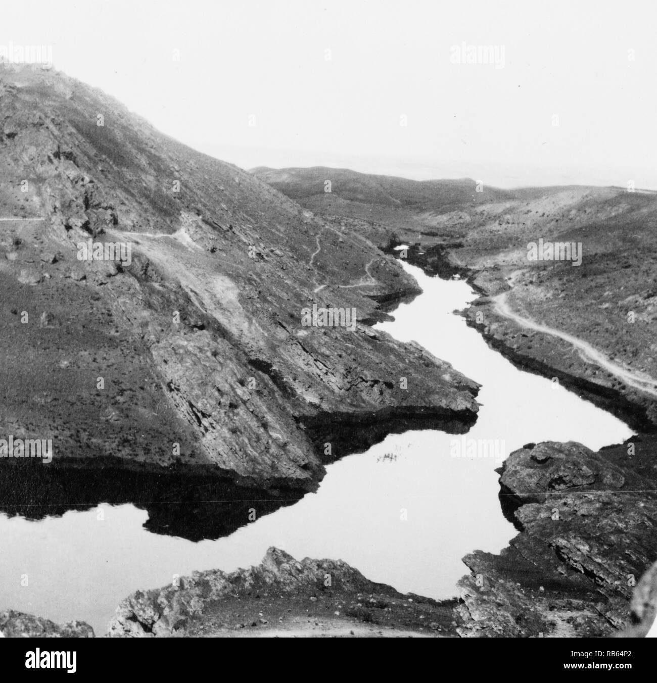Photograph shows river of crude oil as a result of an uncontrolled gusher. Dated 1932 Stock Photo