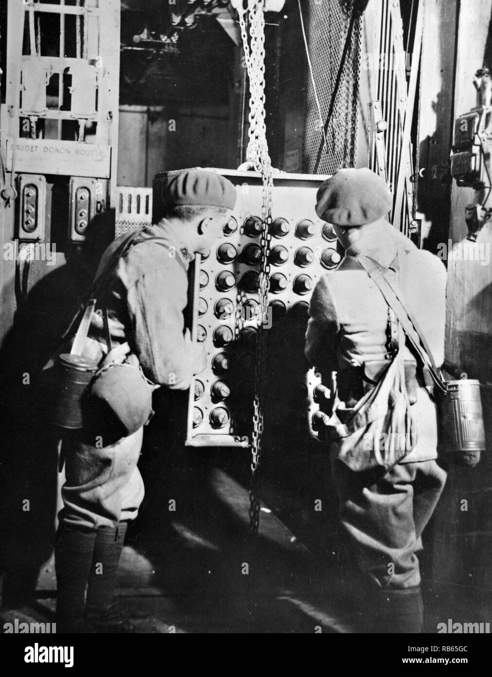 World War Two: French soldiers receive ammunition from an elevator deep inside the fortifications within the Maginot Line, France 1940 Stock Photo
