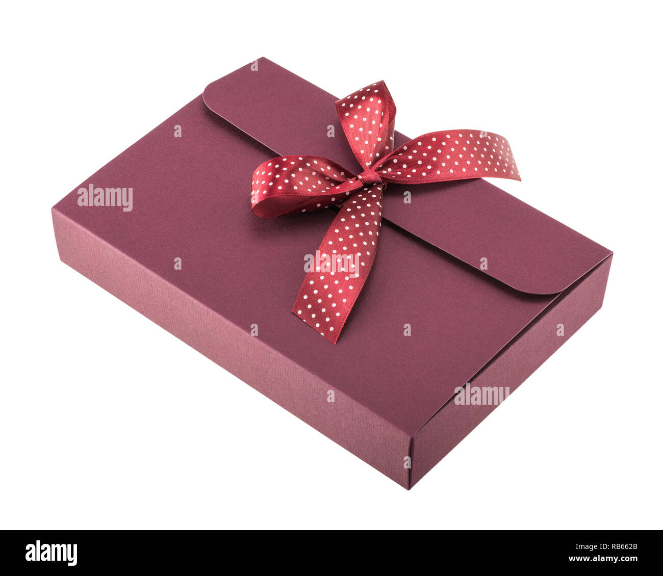 Dark red gift box with polka dot bow isolated on white background Stock Photo