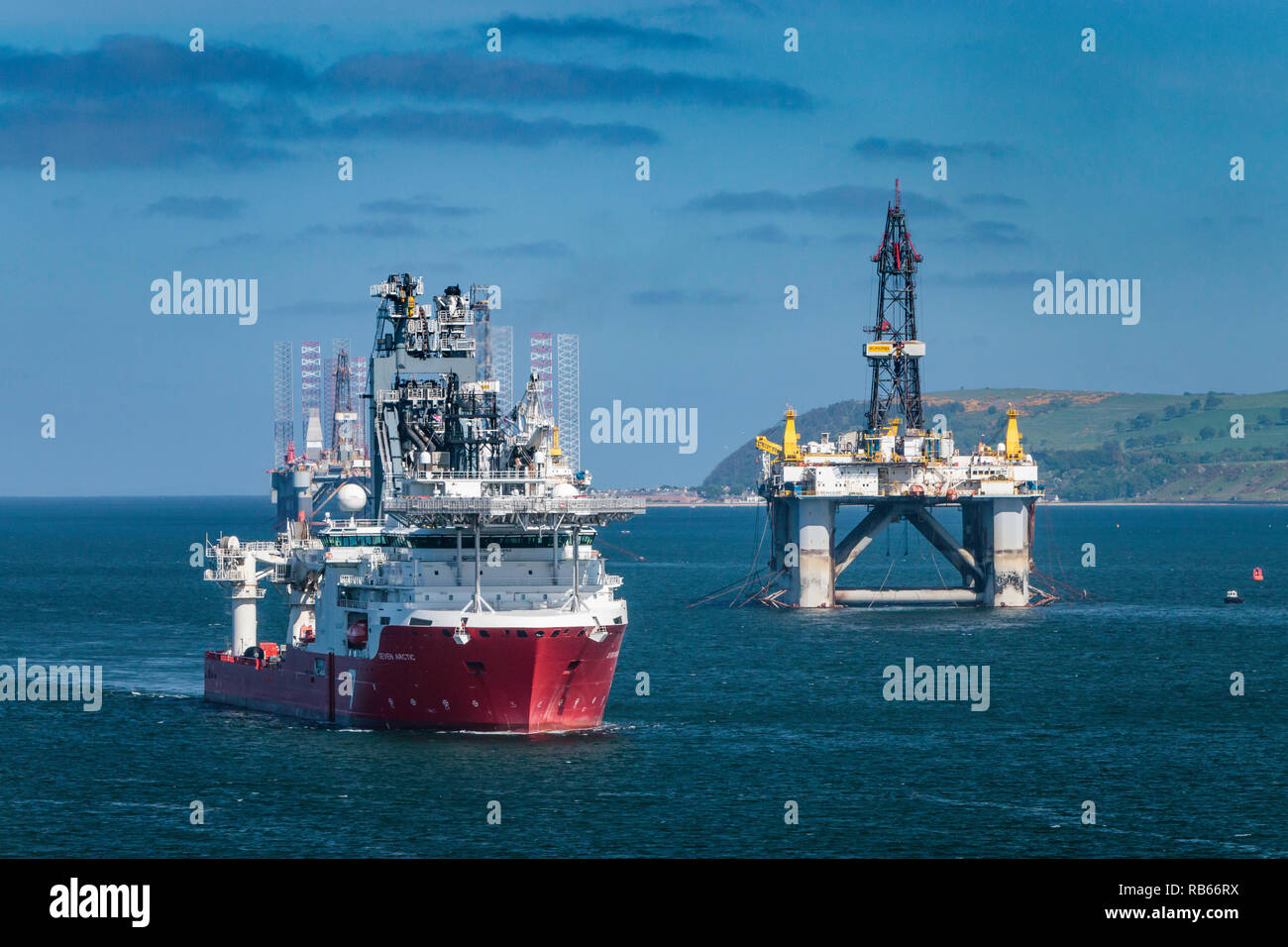 Offshore oil drilling platforms anchored in Cromarty Firth near Invergordon, Scotland, United Kingdom, Europe. Stock Photo
