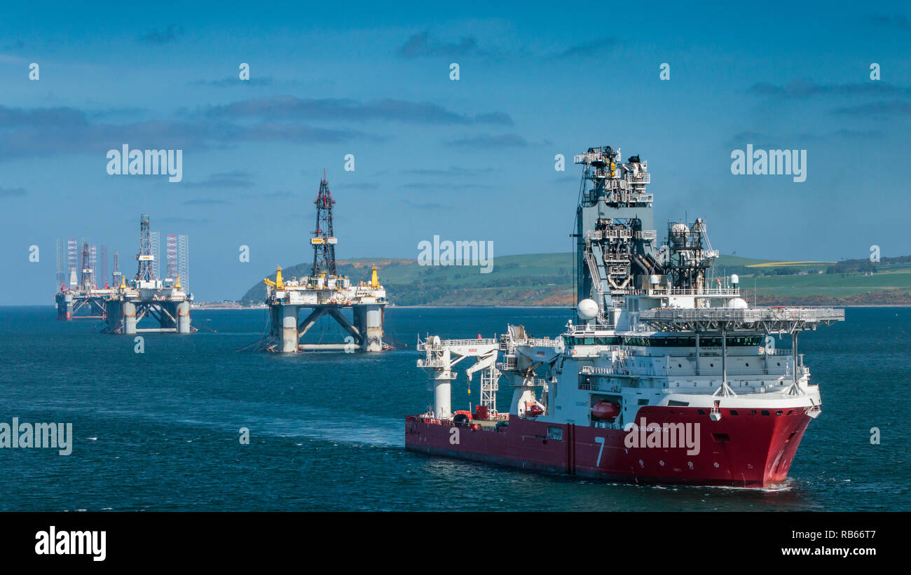 Offshore oil drilling platforms anchored in Cromarty Firth near Invergordon, Scotland, United Kingdom, Europe. Stock Photo
