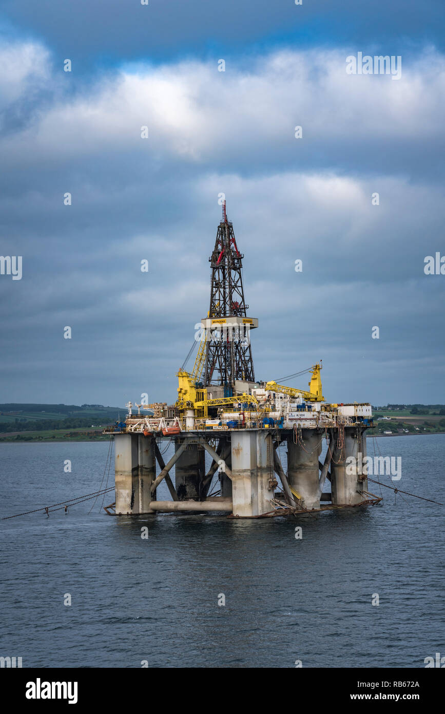 Offshore oil drilling platforms anchored in Cromarty Firth near