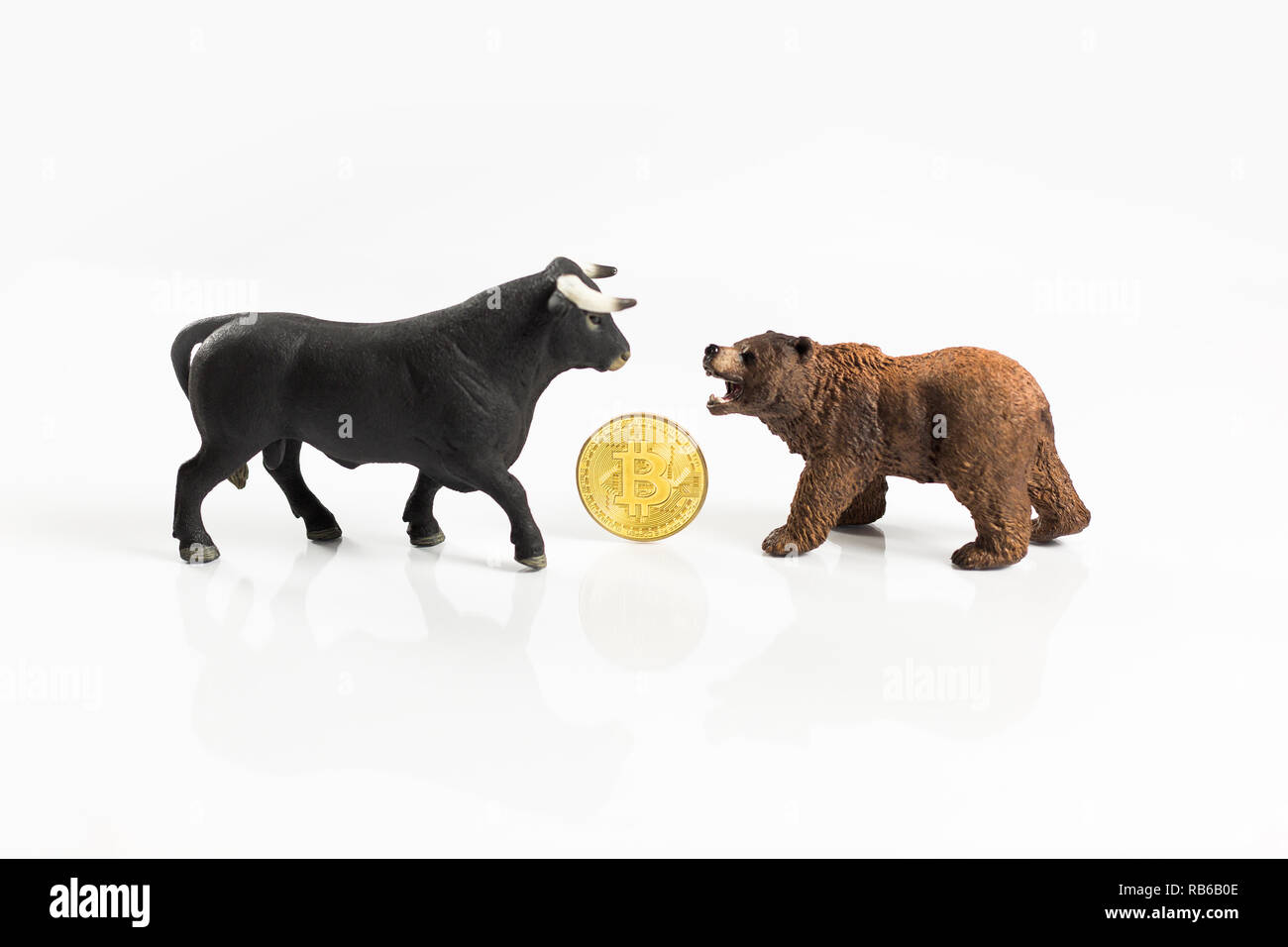 Bear and bull market with Bitcoin on white background Stock Photo